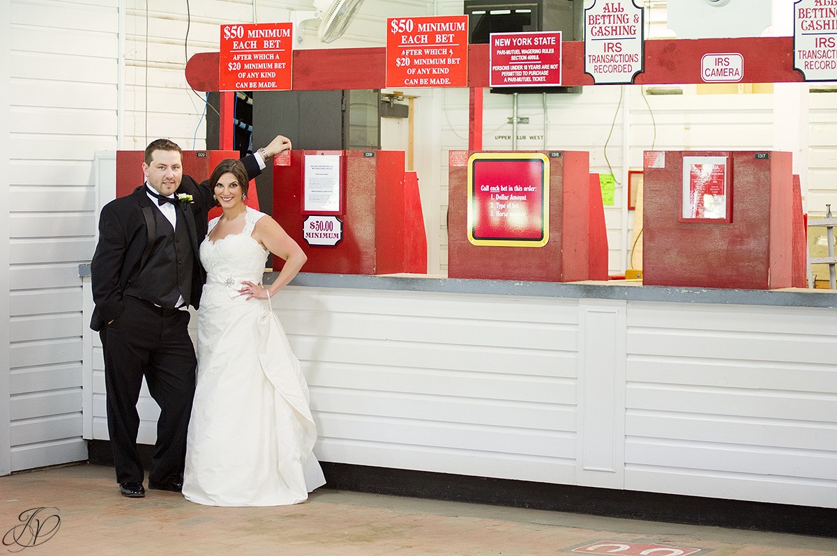 bride and groom at saratoga race track