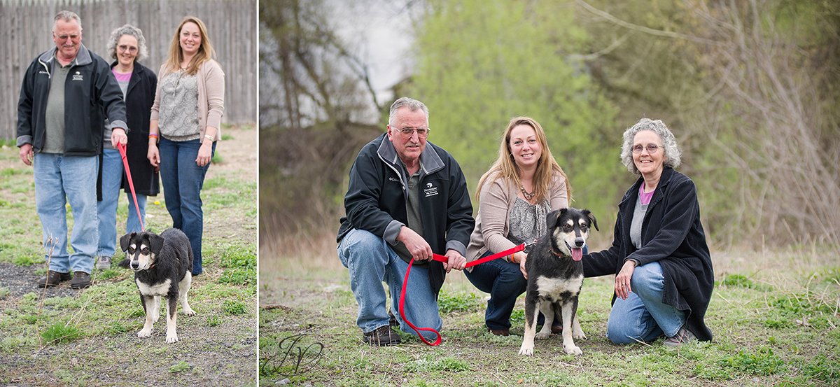 photo of shelter dog with new family and rescuer