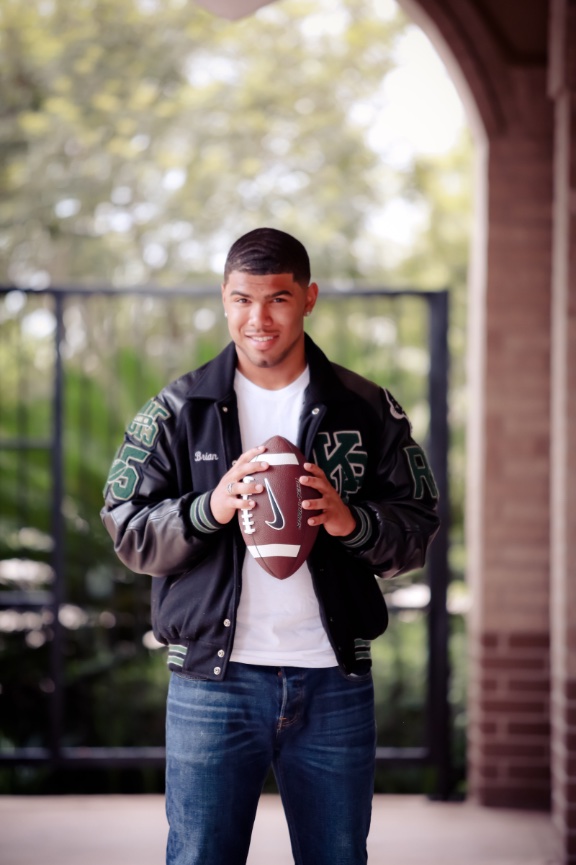 high-school-boy-senior-photos-houston-football-letter-jacket