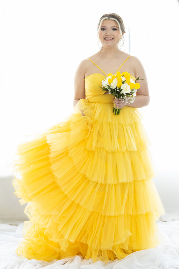 AND THE WINNER OF OUR 2025 SENIOR MAGAZINE COVER CONTEST IS . . .