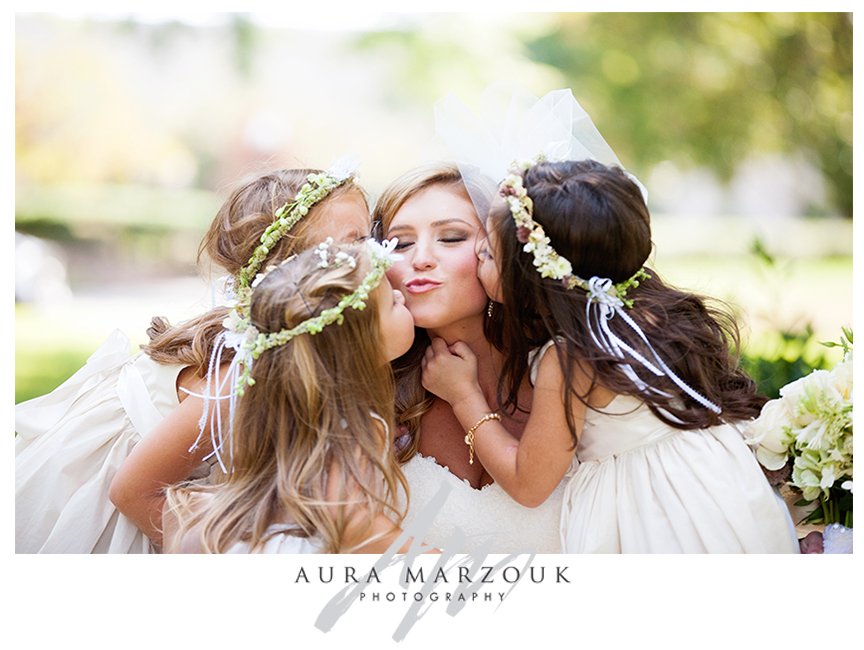 Beautiful flower girls with the bride, with their yellow floral headbands. © Aura Marzouk Photography, Greensboro Wedding Photographer