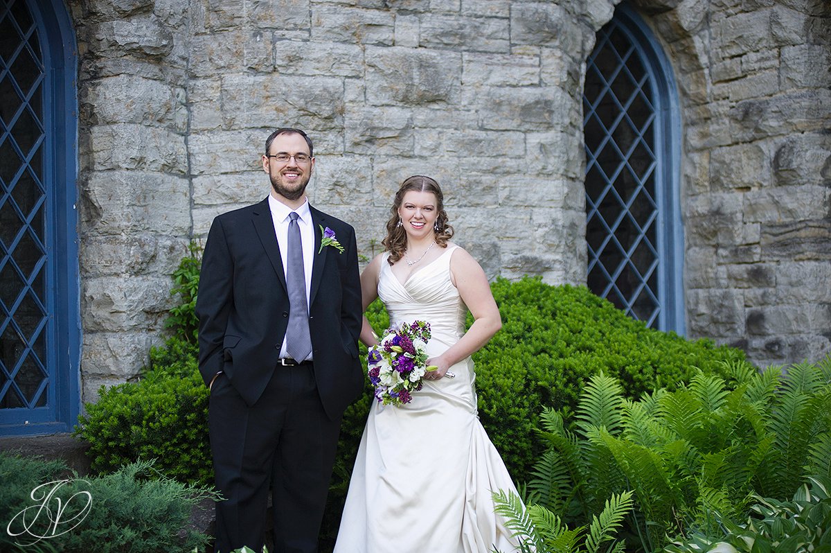 bride and groom portrait, smiling bride and groom photo, bride and groom in front of castle, albany wedding photographers