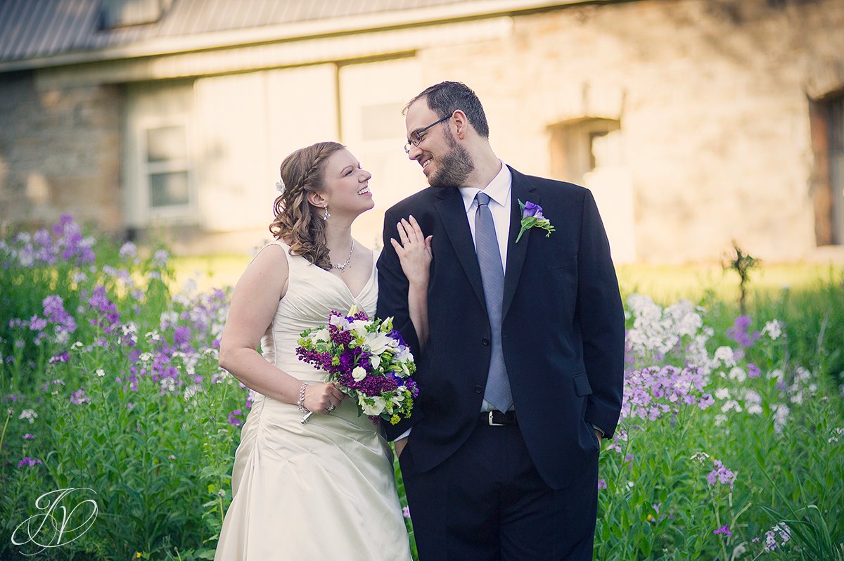 bride and groom portrait, smiling bride and groom photo, bride and groom in front of castle, albany wedding photographers