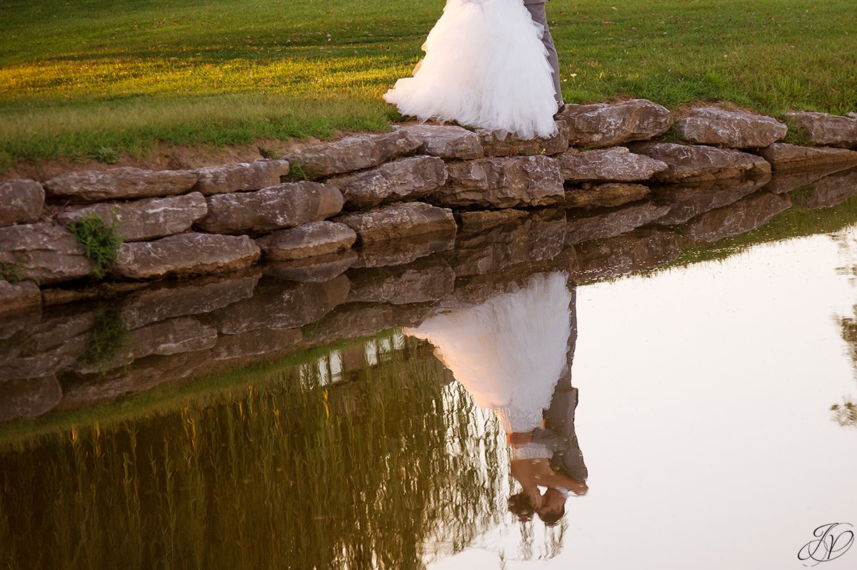 sunset bride and groom Arrowhead Golf Club water reflection