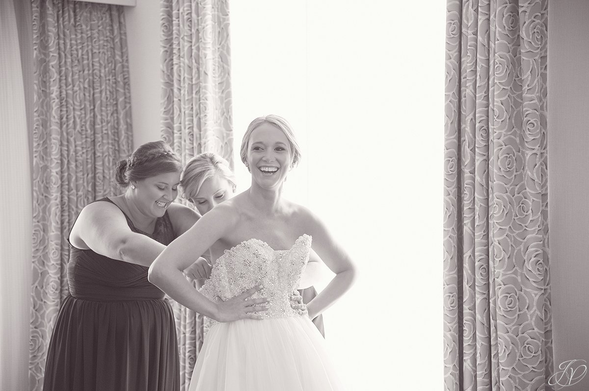 bride getting ready with bridesmaids