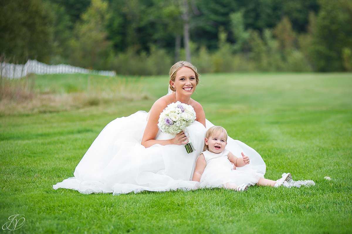 bride and flower girl outside saratoga national