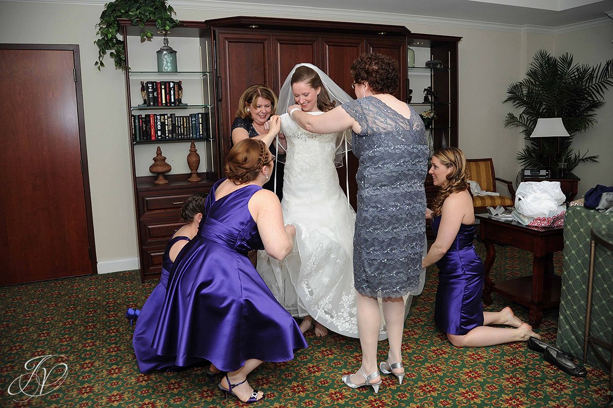 bride putting on wedding gown, finishing touches, beautiful bride photo, wedding gown photo, wedding gown detail photos, Saratoga National Golf Club wedding, Saratoga Wedding Photographer, wedding photographer saratoga ny, wedding detail photos, pre wedding photos