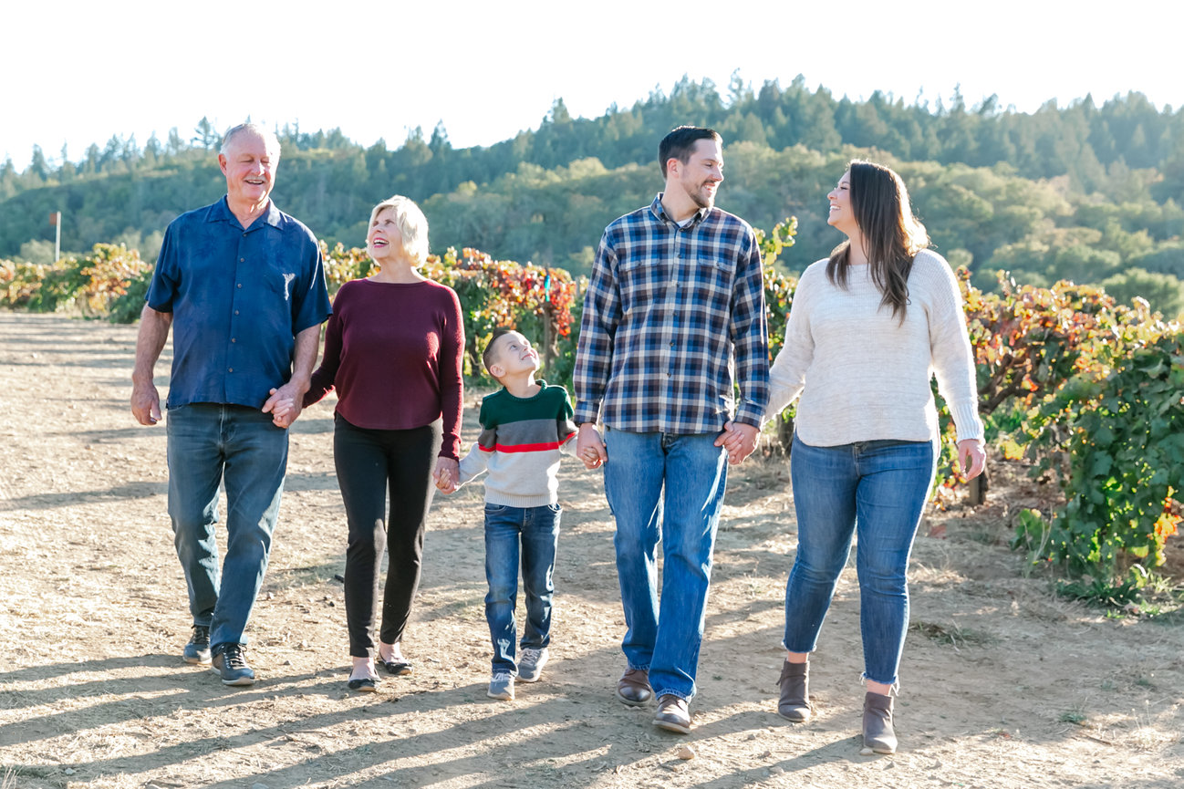 Family portraits during Sunset at Copola Winery in Geyserville,  Sonoma County Ca, taken by Sheila Johnson of Studio J Photography