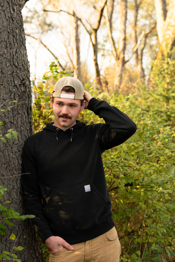 senior guy pictures during the fall outdoors