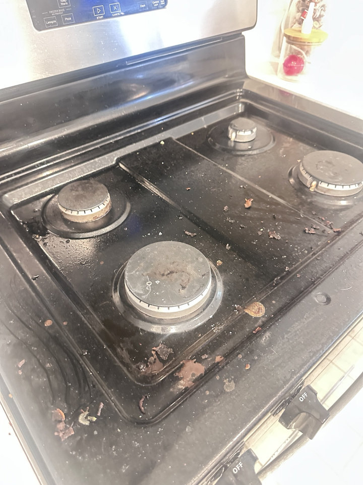 Greasy stove before deep kitchen cleaning in Las Vegas