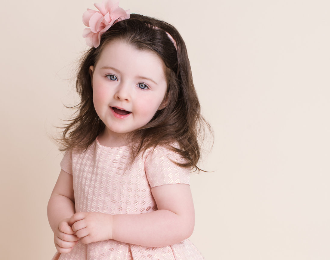 Little girl in a pink dress