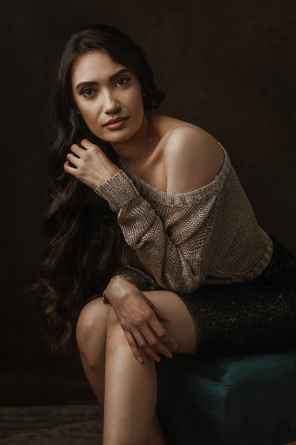 Adam Trujillo Photography offers stunning Las Vegas studio portraits, perfect for makeovers and milestone celebrations. Check out this lovely sultry look with earthtones and fancy brown wardrobe and backdrop.