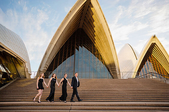 Portrait of a family walking during a Sydney Opera House Photoshoot with Sarah Iris Photography.
