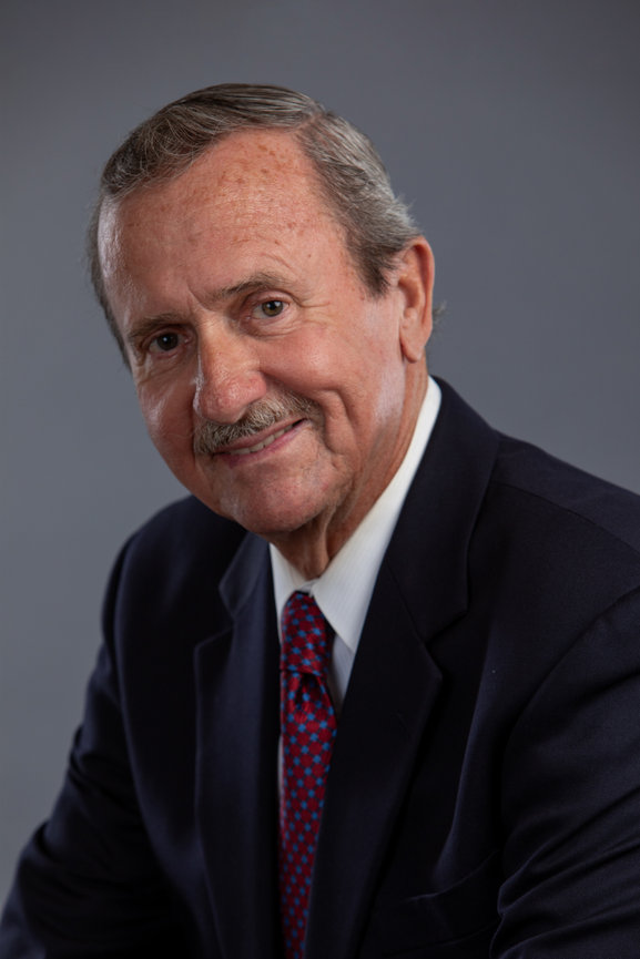 senior executive headshot in a style evoking early hollywood hearthrobs