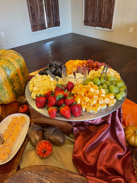 Fruit and cheese platter with autumn decor