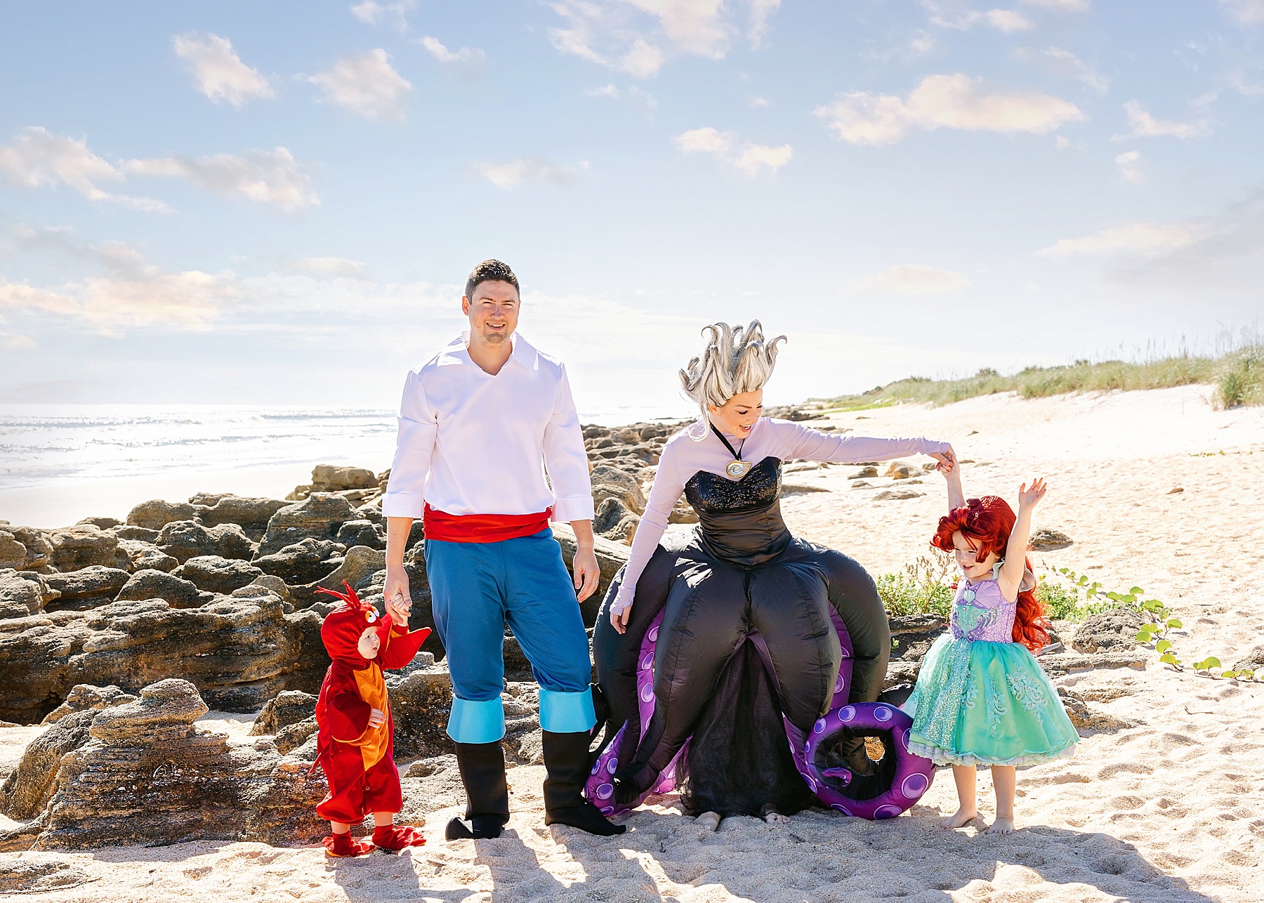 family dressed as disney characters for halloween