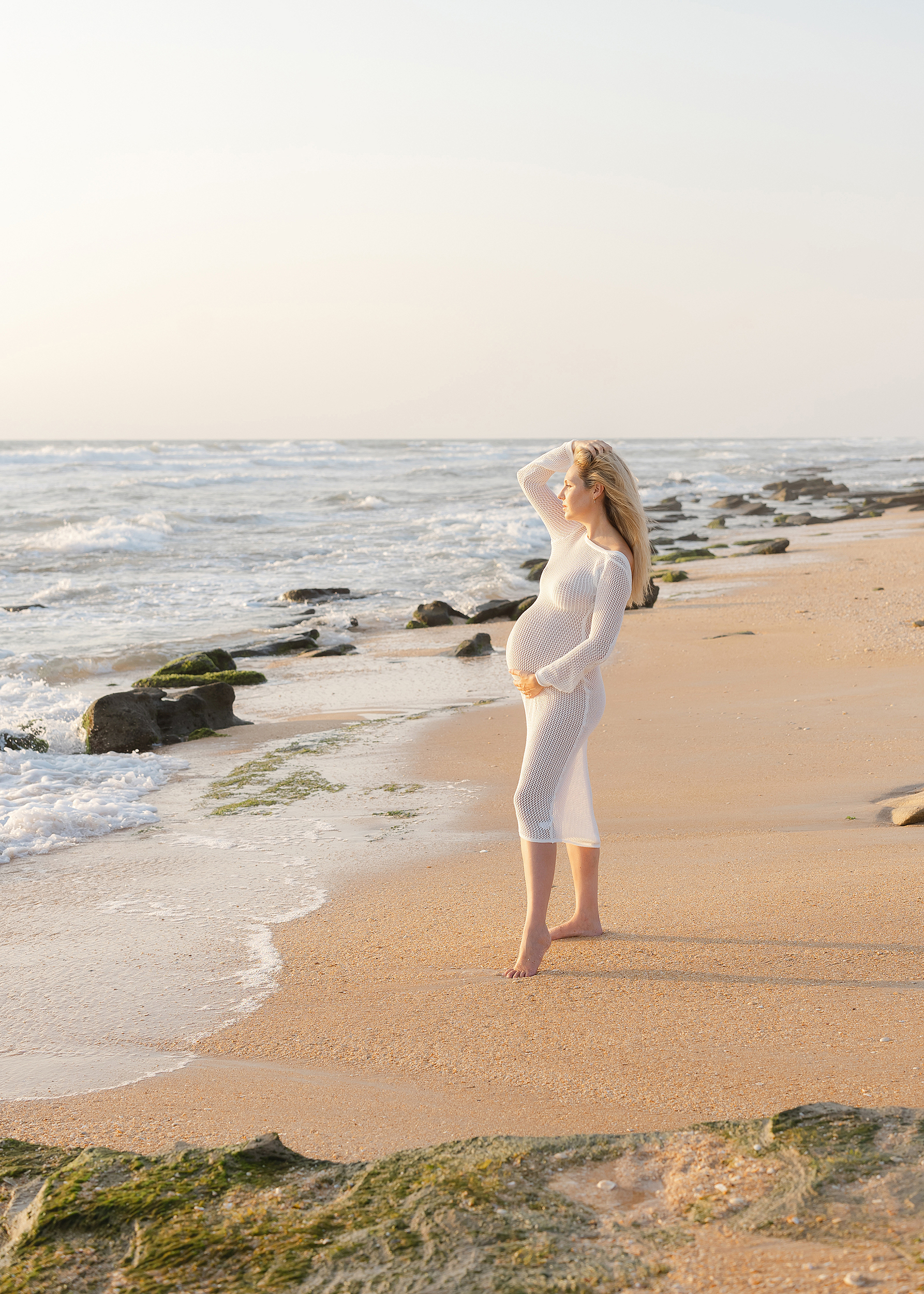 Light and airy maternity portrait session on the beach.