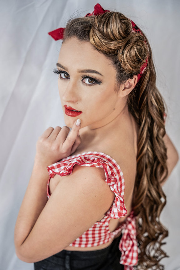 Personalized women's beauty portraits and branding photography in Grand Rapids, MI with a polished finish.
