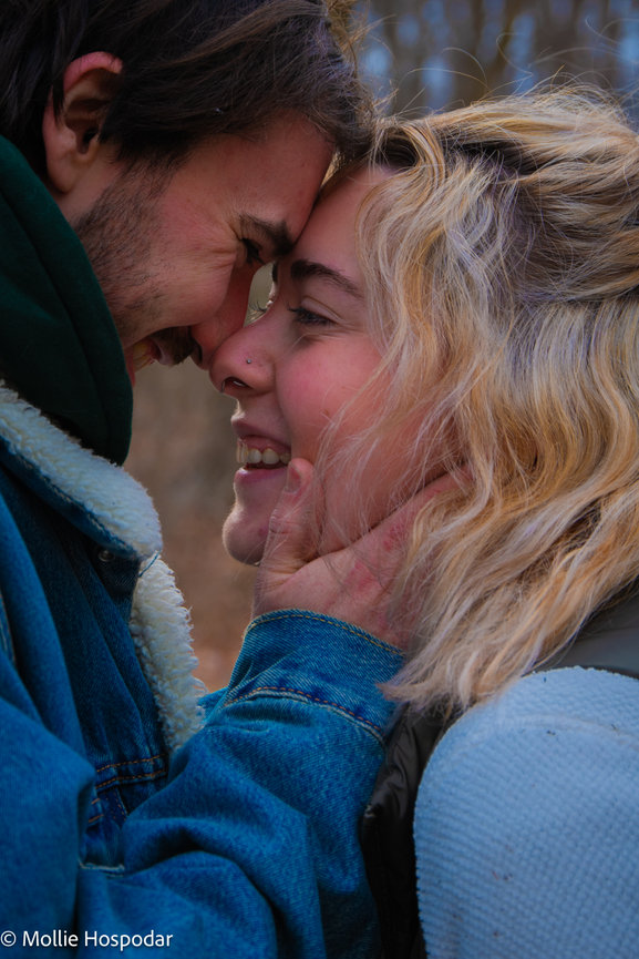 Close-up of couple touching foreheads outdoors