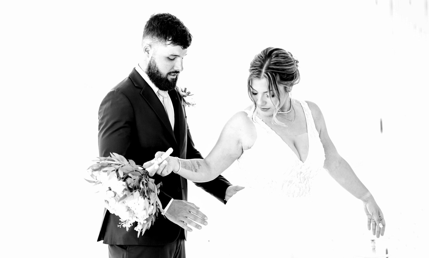 Mt. Top Resort wedding couple groom adjusting bride's dress