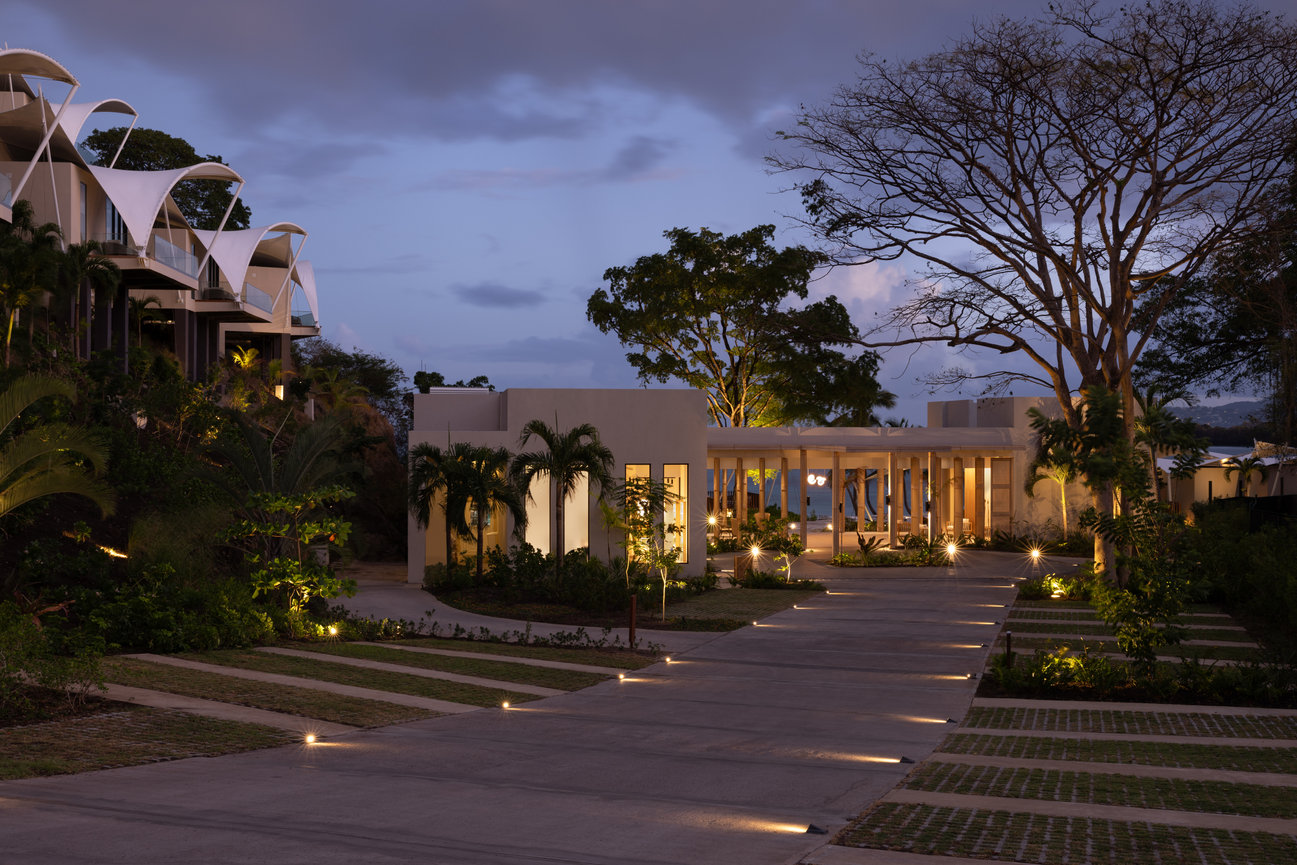 Long driveway leading to Hotel Lobby at Silversands Beach House at early evening.