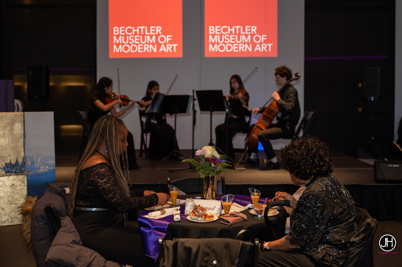 event photography bechtler museum charlotte north carolina event photos of group eating listening to live music orchestra johayesimages