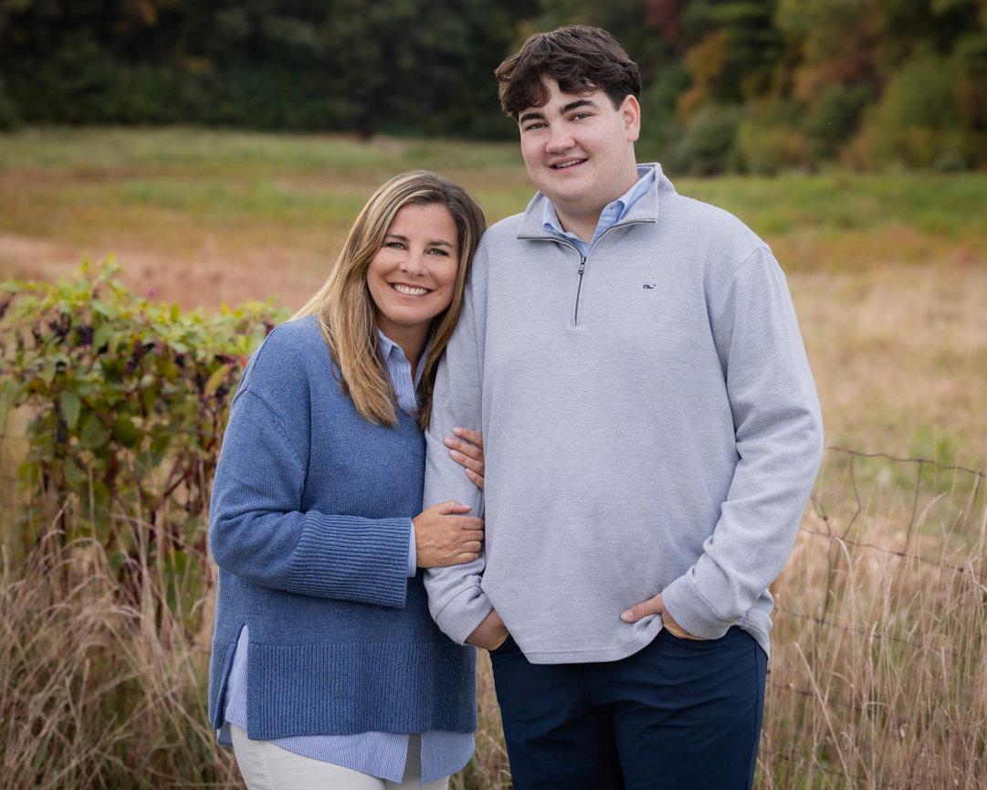 outdoor mother son portrait during the fall in field walpole ma